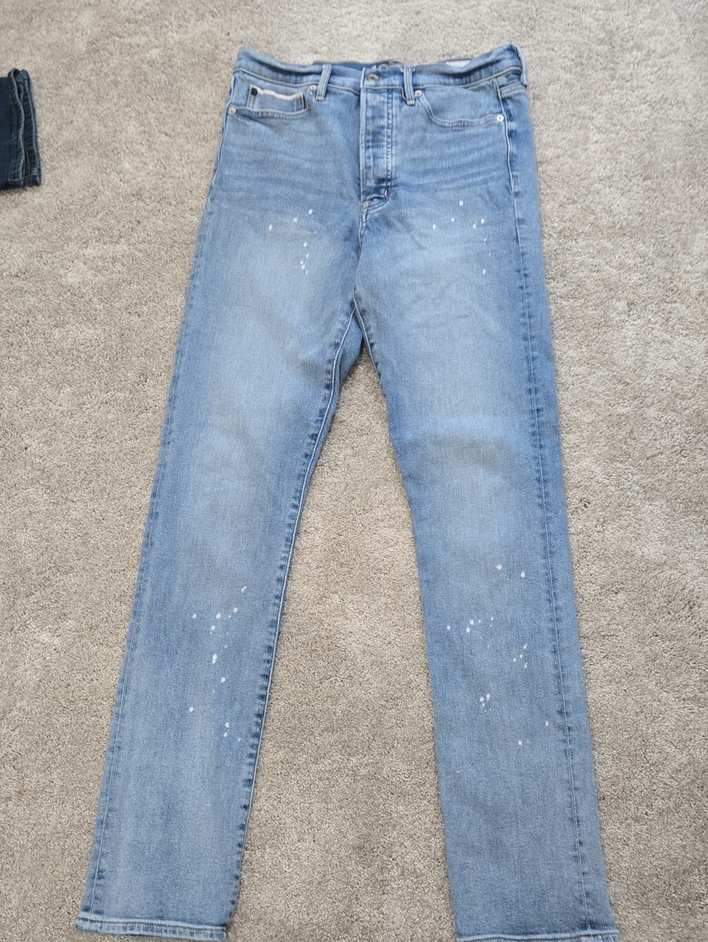 Light Blue Slim Straight Women’s Jeans with Subtle Paint Detail